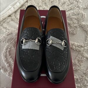 Gucci Black Embossed Loafers with Silver Accents
